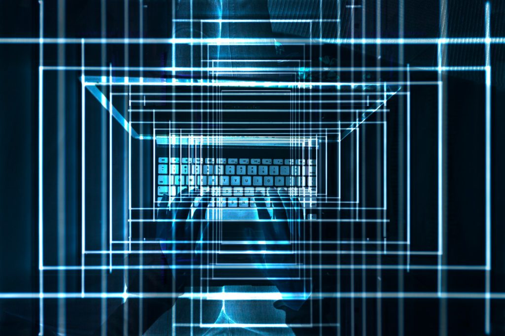 Hands on laptop, bright lights and numbers, visualizing data